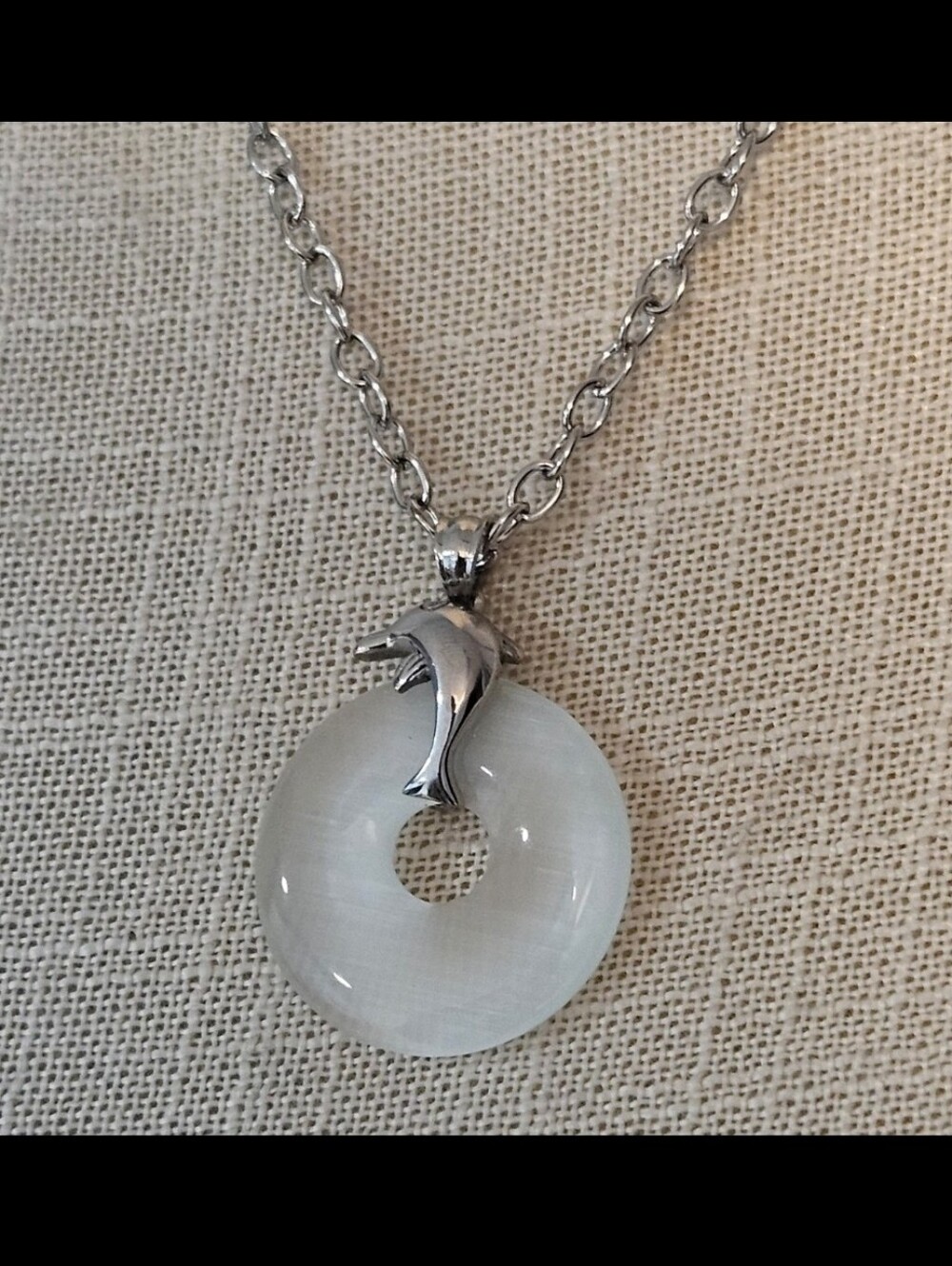 Silver and White Dolphin Pendsng Necklace
